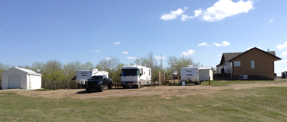 rv park rvs beside building 2